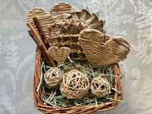 Load image into Gallery viewer, willow basket full of safe healthy chinchilla chew toys and hay 
