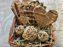 Load image into Gallery viewer, willow basket full of safe healthy chinchilla chew toys and hay 

