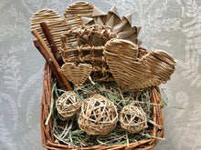 Load image into Gallery viewer, willow basket full of safe healthy chinchilla chew toys and hay 
