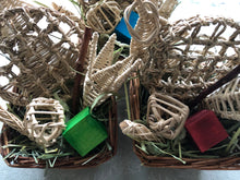 Load image into Gallery viewer, Two woven baskets with additional chew toys on a light background
